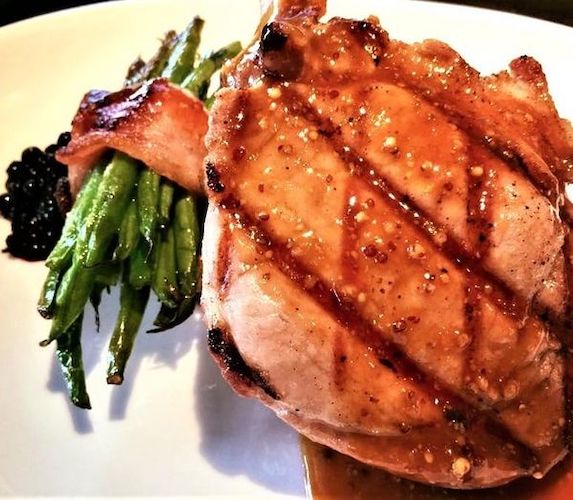 Pork Chop with Huckleberry Sauce